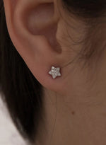 Petites boucles d'oreilles argentées brillantes, motif mini étoile