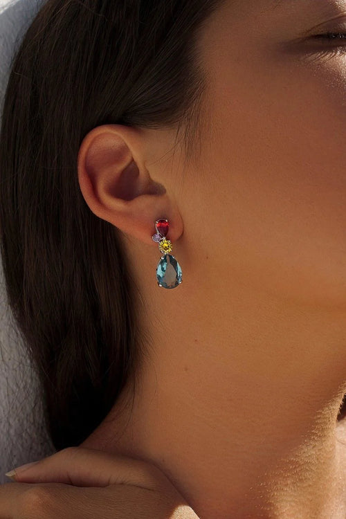 Boucles d'oreilles en pierres colorées avec zircone bleue en taille poire