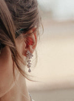 Boucles d'oreilles de mariée en argent et zircone de différentes tailles