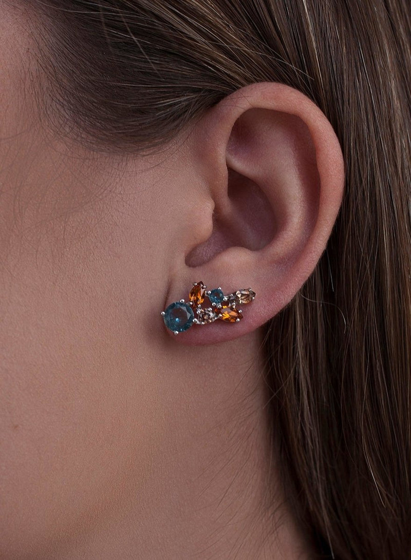 Boucles d'oreilles grimpantes en argent avec motif feuille bleue
